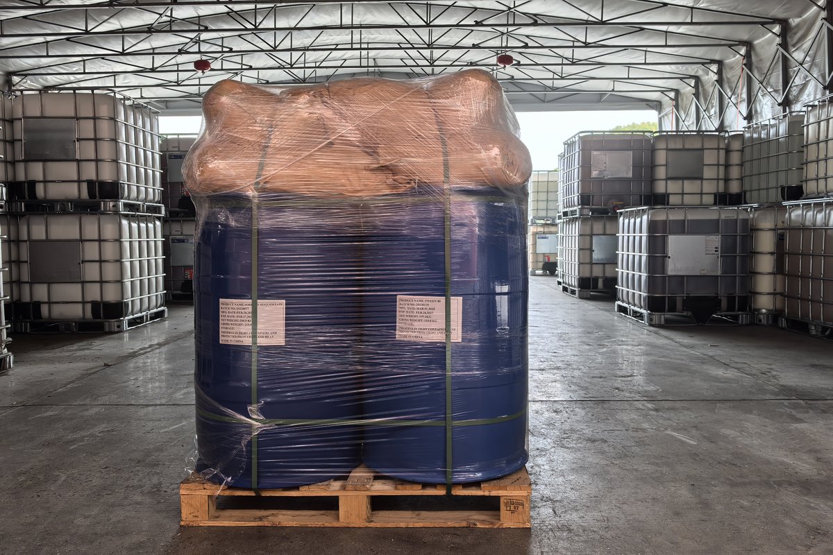 Chemical drums and IBC totes in warehouse